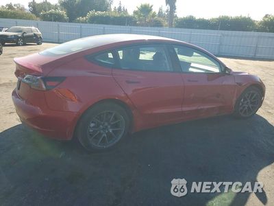 Trzecie zdjęcie samochodu z tyłu: 2023 TESLA MODEL 3 VIN:5YJ3E1EA0PF714549 - miniatura
