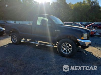 Czwarte zdjęcie samochodu z boku: 2004 FORD F250 SUPER DUTY VIN:1FTNF21L44ED87928 - miniatura