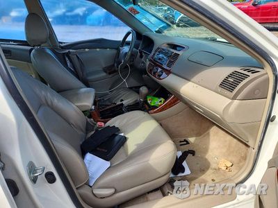 Zdjęcie 7 z 12 samochodu: 2004 TOYOTA CAMRY LE VIN:JTDBE32K640286436 - miniatura