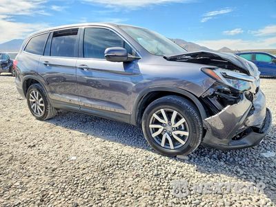 Czwarte zdjęcie samochodu z boku: 2021 HONDA PILOT EXL VIN:5FNYF6H58MB066615 - miniatura