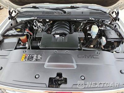 Zdjęcie 12 z 13 samochodu: 2020 GMC YUKON XL DENALI VIN:1GKS1HKJ9LR220865 - miniatura