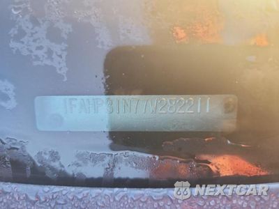 Zdjęcie 12 z 12 samochodu: 2007 FORD FOCUS ZX3 VIN:1FAHP31N77W282211 - miniatura