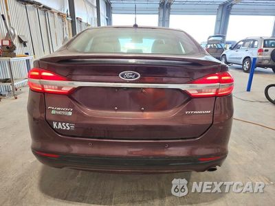 Zdjęcie 6 z 12 samochodu: 2017 FORD FUSION TITANIUM PHEV VIN:3FA6P0SU3HR147470 - miniatura