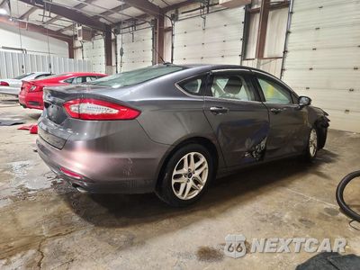 Trzecie zdjęcie samochodu z tyłu: 2016 FORD FUSION SE VIN:3FA6P0H74GR273157 - miniatura
