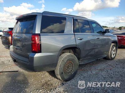 Trzecie zdjęcie samochodu z tyłu: 2020 CHEVROLET TAHOE C1500 LT VIN:1GNSCBKCXLR174698 - miniatura