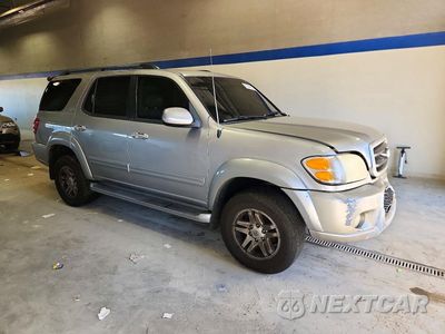 Czwarte zdjęcie samochodu z boku: 2004 TOYOTA SEQUOIA SR5 VIN:5TDBT44A44S208170 - miniatura
