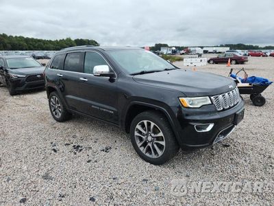 Czwarte zdjęcie samochodu z boku: 2017 JEEP GRAND CHEROKEE OVERLAND VIN:1C4RJFCG6HC837409 - miniatura