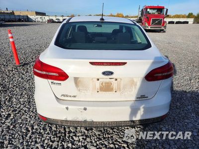 Zdjęcie 6 z 12 samochodu: 2016 FORD FOCUS SE VIN:1FADP3F25GL244457 - miniatura