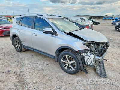 Czwarte zdjęcie samochodu z boku: 2015 TOYOTA RAV4 XLE VIN:JTMWFREV8FJ051430 - miniatura