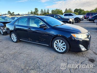 Czwarte zdjęcie samochodu z boku: 2012 TOYOTA CAMRY HYBRID XLE VIN:4T1BD1FK7CU023585 - miniatura
