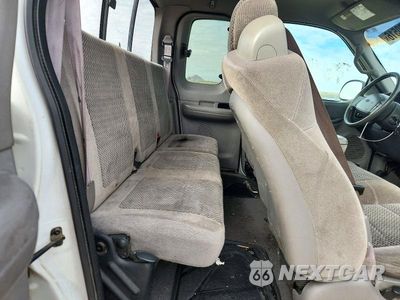 Zdjęcie 10 z 12 samochodu: 2001 FORD F150 VIN:1FTRX18W31NA50445 - miniatura