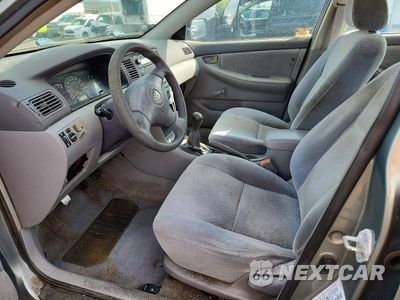Zdjęcie 7 z 13 samochodu: 2003 TOYOTA COROLLA CE VIN:1NXBR32E83Z136717 - miniatura