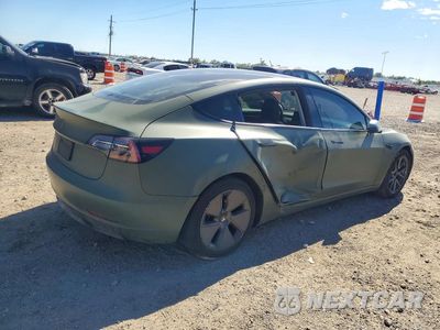 Trzecie zdjęcie samochodu z tyłu: 2023 TESLA MODEL 3 VIN:5YJ3E1EA8PF470813 - miniatura