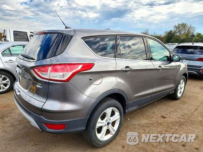 Trzecie zdjęcie samochodu z tyłu: 2014 FORD ESCAPE SE VIN:1FMCU9GX3EUC09768 - miniatura