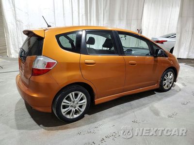 Trzecie zdjęcie samochodu z tyłu: 2009 HONDA FIT SPORT VIN:JHMGE88439S074874 - miniatura