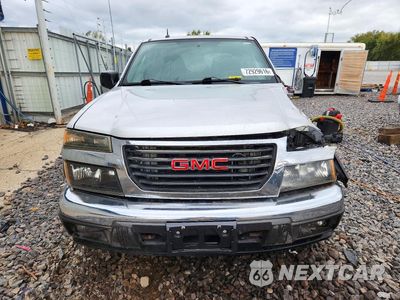 Piąte zdjęcie samochodu w środku: 2011 GMC CANYON SLE VIN:1GTH6MFE5B8128668 - miniatura