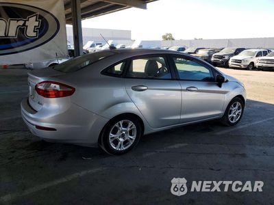 Trzecie zdjęcie samochodu z tyłu: 2014 FORD FIESTA SE VIN:3FADP4BJ3EM139754 - miniatura