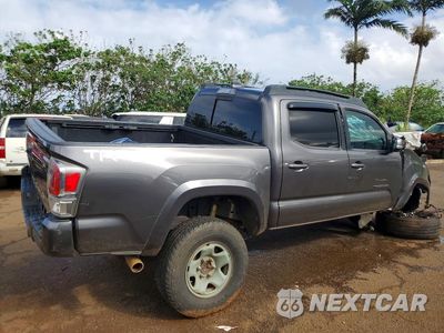 Trzecie zdjęcie samochodu z tyłu: 2021 TOYOTA TACOMA SR V6 VIN:3TYCZ5AN6MT022666 - miniatura