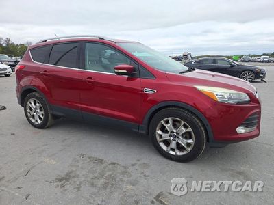 Czwarte zdjęcie samochodu z boku: 2014 FORD ESCAPE TITANIUM VIN:1FMCU0J91EUC36361 - miniatura