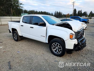 Czwarte zdjęcie samochodu z boku: 2021 GMC CANYON AT4 VIN:1GTG6FEN5M1273424 - miniatura