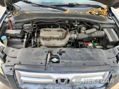 Zdjęcie 12 z 13 samochodu: 2006 HONDA PILOT EX VIN:2HKYF18556H522626 - miniatura