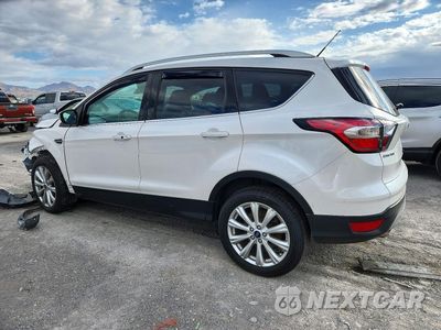 Drugie zdjęcie samochodu z przodu: 2017 FORD ESCAPE TITANIUM VIN:1FMCU0J93HUD54299 - miniatura
