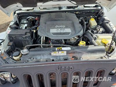 Zdjęcie 11 z 12 samochodu: 2013 JEEP WRANGLER UNLIMITED SAHARA VIN:1C4BJWEG0DL603873 - miniatura