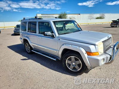 Czwarte zdjęcie samochodu z boku: 2006 JEEP COMMANDER LIMITED VIN:1J8HH58246C220286 - miniatura