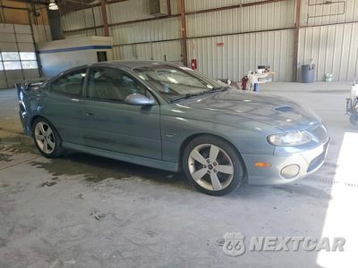 Czwarte zdjęcie samochodu z boku: 2006 PONTIAC GTO VIN:6G2VX12U06L825235 - miniatura