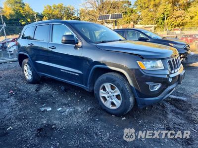 Czwarte zdjęcie samochodu z boku: 2015 JEEP GRAND CHEROKEE LAREDO VIN:1C4RJFAG0FC660811 - miniatura