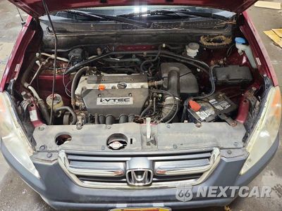 Zdjęcie 12 z 13 samochodu: 2004 HONDA CR-V LX VIN:JHLRD78474C014142 - miniatura