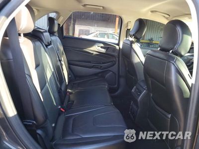 Zdjęcie 10 z 12 samochodu: 2019 FORD EDGE TITANIUM VIN:2FMPK4K95KBC23417 - miniatura