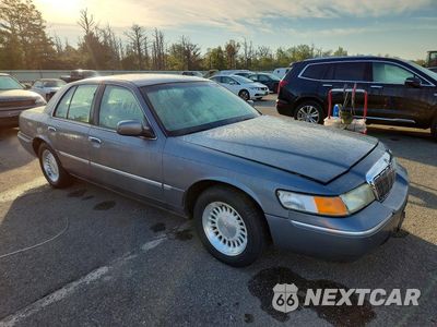 Czwarte zdjęcie samochodu z boku: 1999 MERCURY GRAND MARQUIS LS VIN:2MEFM75W4XX702448 - miniatura