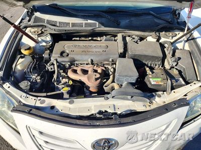 Zdjęcie 11 z 12 samochodu: 2007 TOYOTA CAMRY LE VIN:4T1BE46KX7U596503 - miniatura