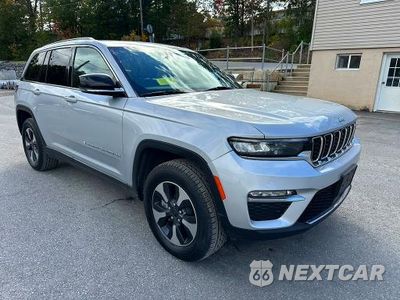 Czwarte zdjęcie samochodu z boku: 2024 JEEP GRAND CHEROKEE LIMITED 4XE VIN:1C4RJYB66R8516818 - miniatura