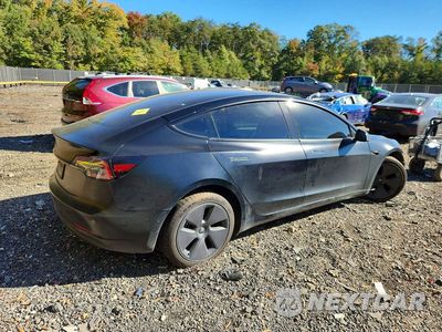 Trzecie zdjęcie samochodu z tyłu: 2022 TESLA MODEL 3 VIN:5YJ3E1EA4NF341853 - miniatura