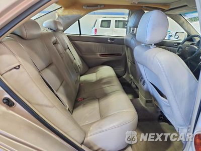 Zdjęcie 10 z 13 samochodu: 2002 TOYOTA CAMRY XLE VIN:4T1BE30K12U013506 - miniatura