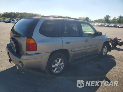 Trzecie zdjęcie samochodu z tyłu: 2002 GMC ENVOY VIN:1GKDT13S222423394 - miniatura