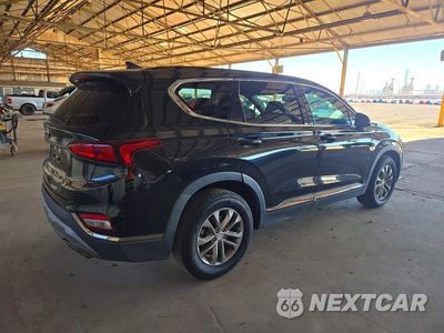 Trzecie zdjęcie samochodu z tyłu: 2019 HYUNDAI SANTA FE SEL 2.4L VIN:5NMS33AD0KH034705 - miniatura