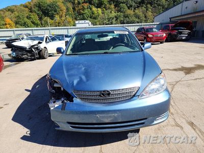 Piąte zdjęcie samochodu w środku: 2004 TOYOTA CAMRY LE VIN:4T1BE32K24U879599 - miniatura