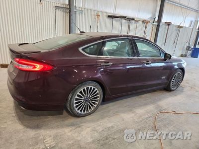 Trzecie zdjęcie samochodu z tyłu: 2017 FORD FUSION TITANIUM PHEV VIN:3FA6P0SU3HR147470 - miniatura