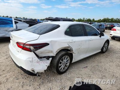 Trzecie zdjęcie samochodu z tyłu: 2021 TOYOTA CAMRY LE VIN:4T1C11AK1MU544470 - miniatura
