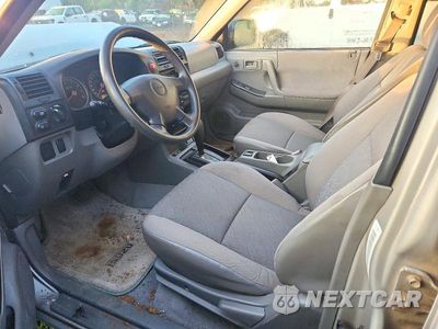 Zdjęcie 7 z 13 samochodu: 2004 ISUZU RODEO S VIN:4S2DM58W844308256 - miniatura