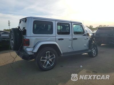 Trzecie zdjęcie samochodu z tyłu: 2022 JEEP WRANGLER UNLIMITED SAHARA 4XE VIN:1C4JJXP68NW228093 - miniatura