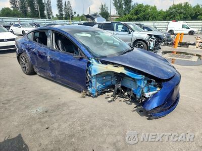 Czwarte zdjęcie samochodu z boku: 2022 TESLA MODEL 3 VIN:5YJ3E1EA9NF288499 - miniatura