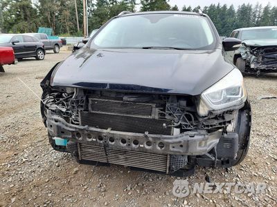 Piąte zdjęcie samochodu w środku: 2017 FORD ESCAPE TITANIUM VIN:1FMCU0J9XHUD95786 - miniatura