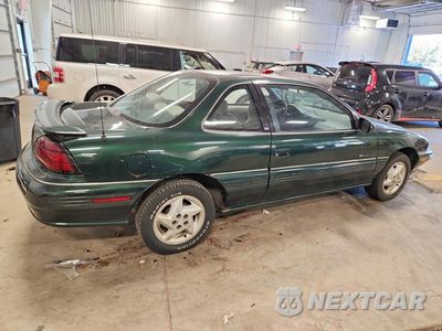 Trzecie zdjęcie samochodu z tyłu: 1995 PONTIAC GRAND AM SE VIN:1G2NE15M5SM555096 - miniatura