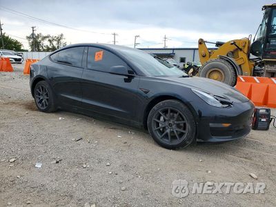 Czwarte zdjęcie samochodu z boku: 2022 TESLA MODEL 3 VIN:5YJ3E1EB3NF341318 - miniatura