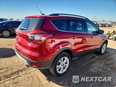 Trzecie zdjęcie samochodu z tyłu: 2018 FORD ESCAPE SE VIN:1FMCU9GD2JUA95150 - miniatura