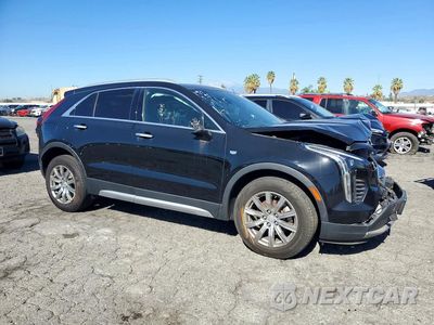 Czwarte zdjęcie samochodu z boku: 2019 CADILLAC XT4 PREMIUM LUXURY VIN:1GYFZCR41KF155206 - miniatura